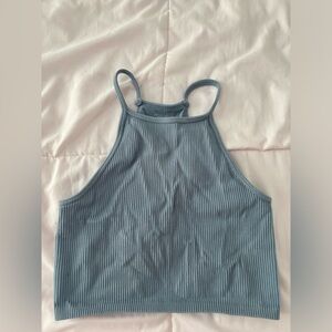 stretchy blue cropped tank top.